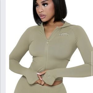 Olive green fitted hoodie zip up sweater.